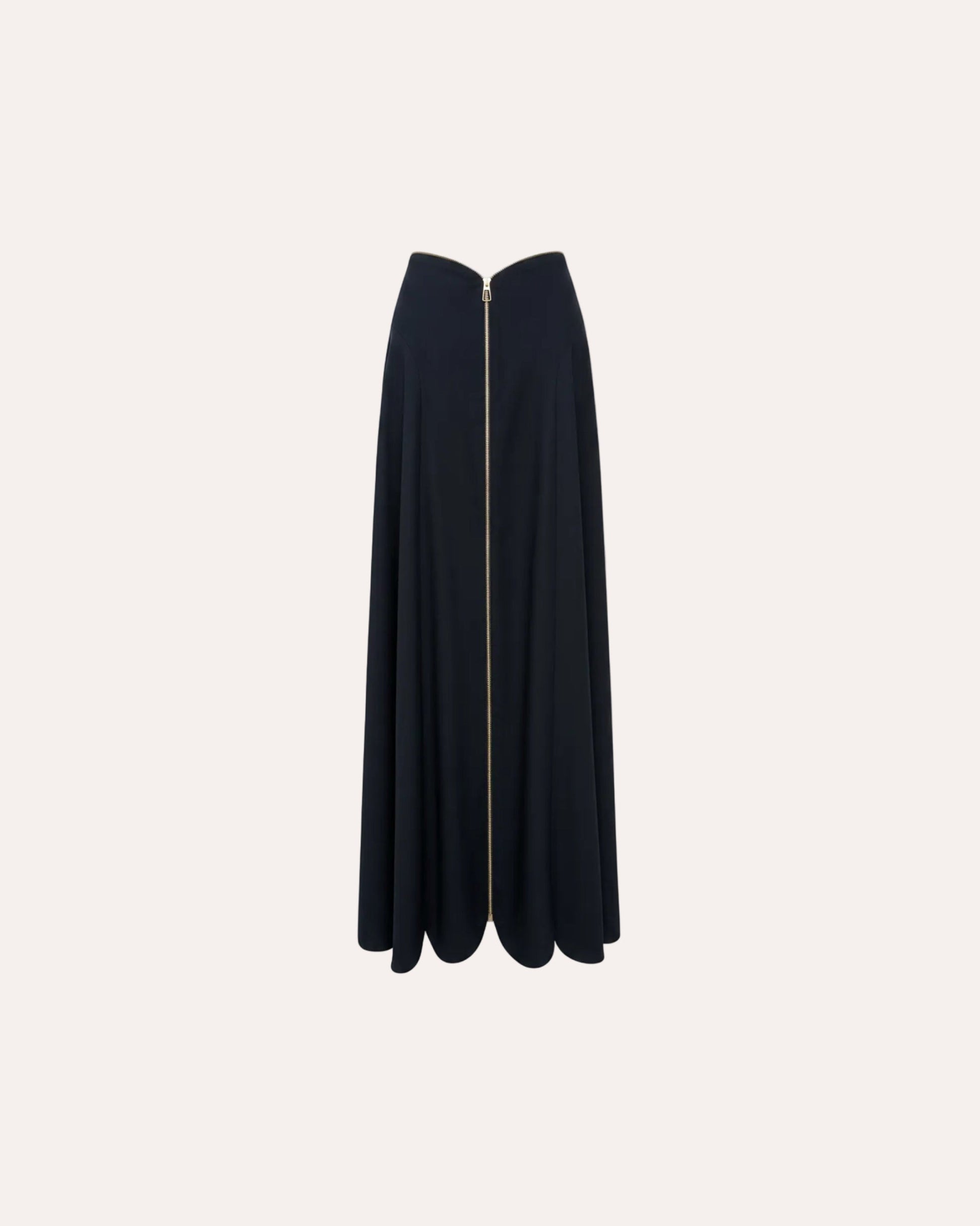 A black midi skirt with a sweetheart neckline and a prominent gold front zipper, shown against a light off-white background.