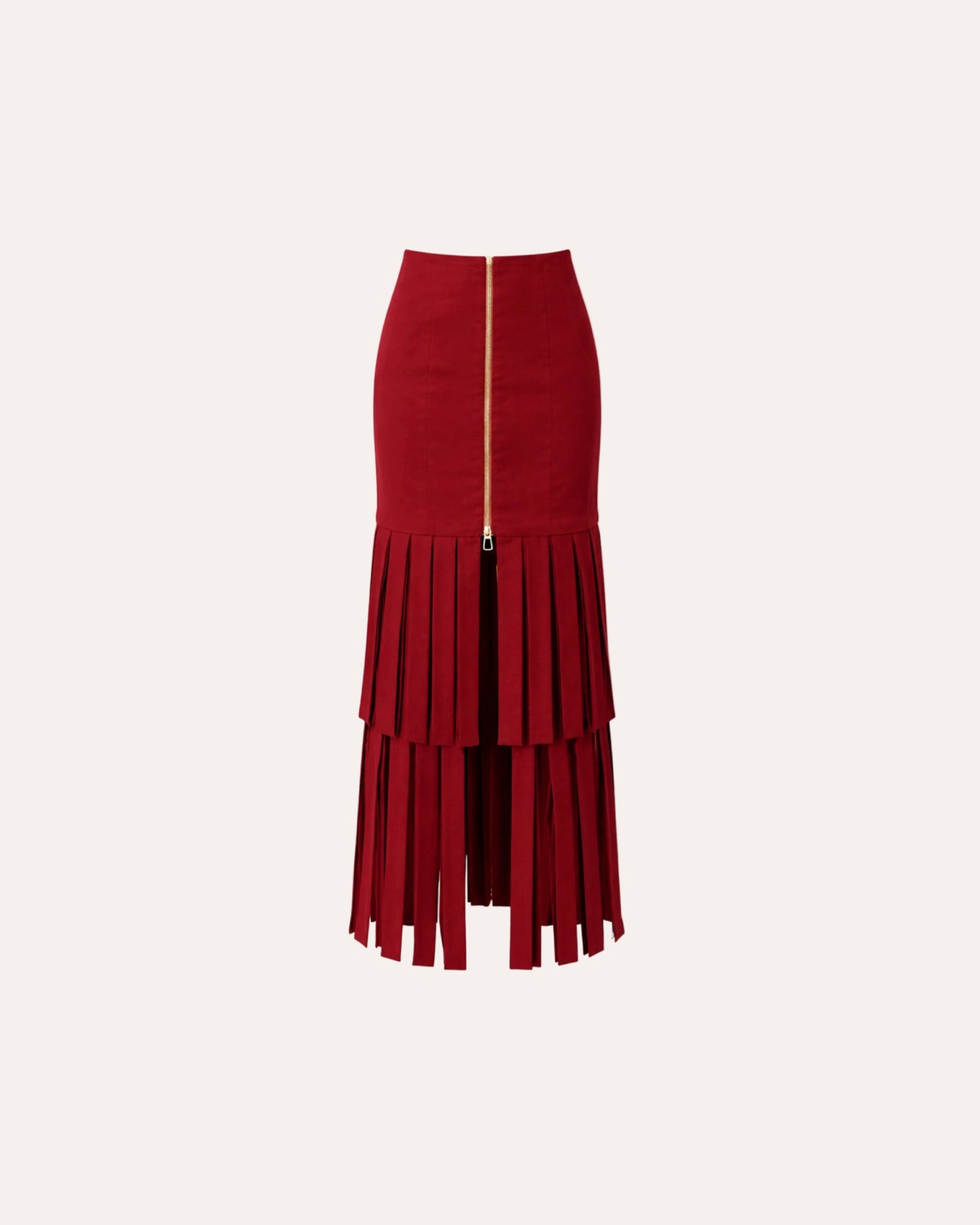 A red midi skirt featuring a high-waisted fitted top section, a tiered pleated lower half, and a prominent gold front zipper.